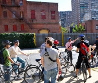 A group of bicyclists check out a former brewery in Bushwick