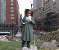 Matthew Baker reads some poetry at the Irish Hunger Memorial
