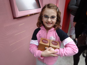 Eliza Holland Madore with her bounty from the Sprinkles Cupcake ATM.