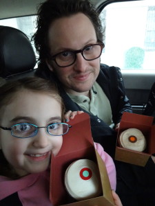 Eliza Holland Madore and David Madore are happy to eat their cupcakes from the Sprinkles Cupcake ATM on the go!
